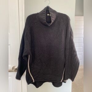 Black sweater with flattering grey stripes